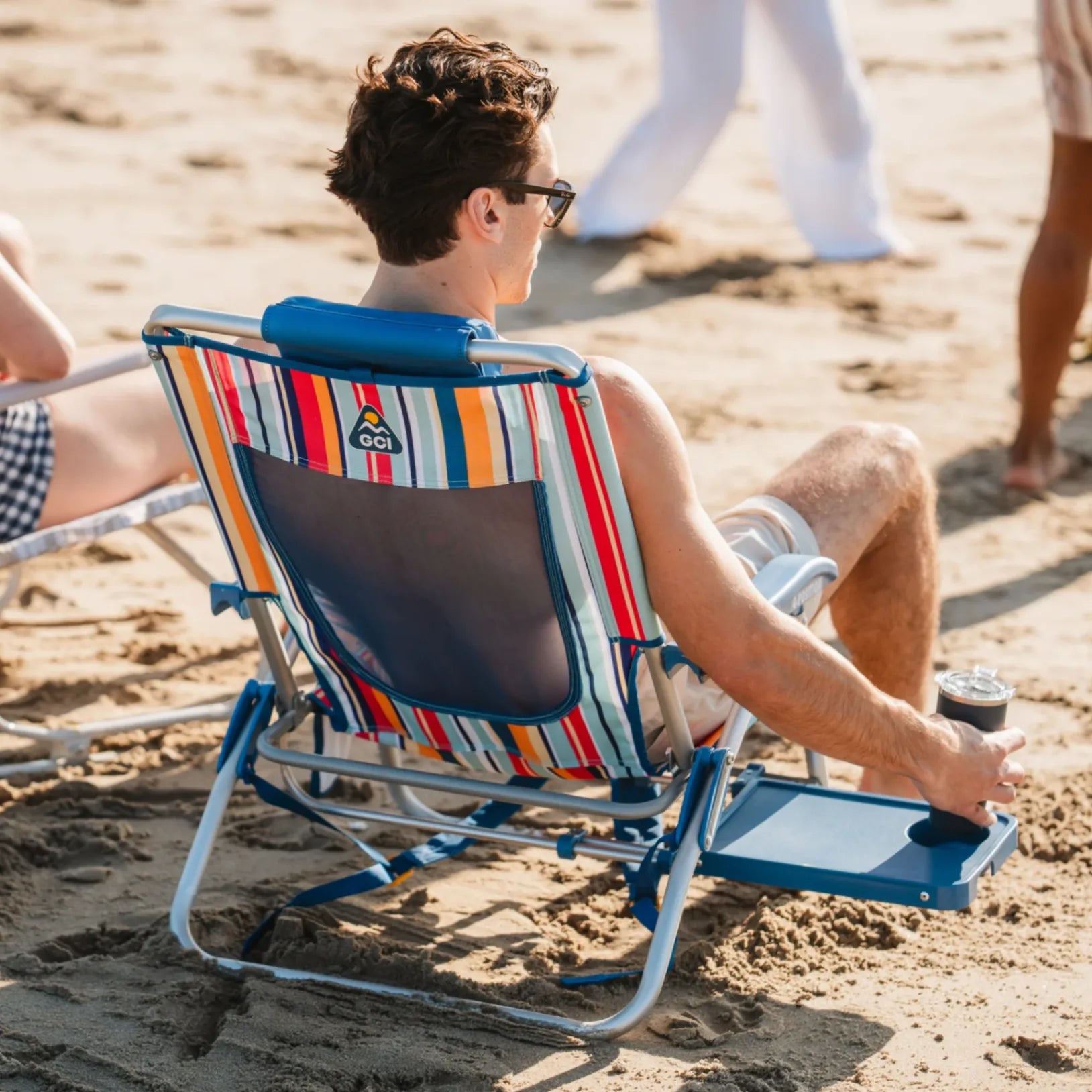 Sand-Friendly Big Surf with Slide Table - Choice 334 - Low-Profile Reclining Beach Chair with Backpack Straps Detail